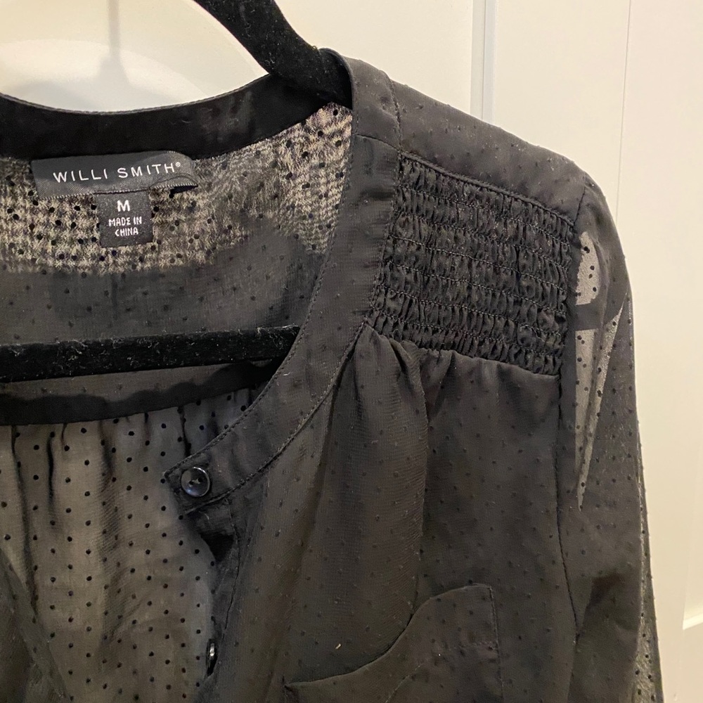 Sheer black tunic with polka dot detail